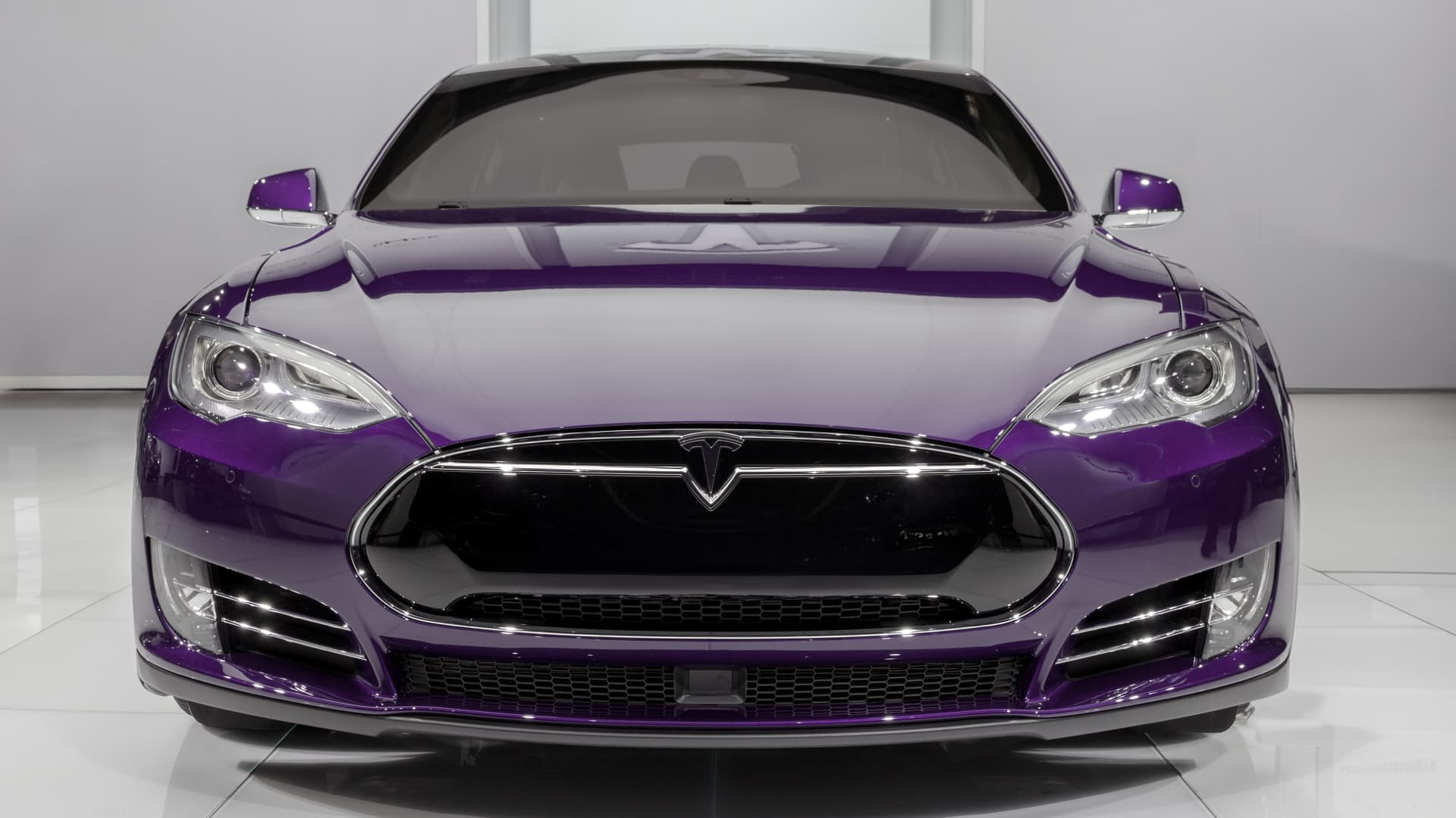 Tesla vehicles lined up after window film